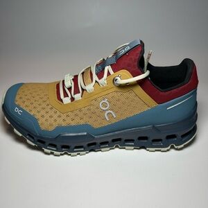 On Running Trail Shoe in mustard, navy blue, and burgundy, U.S. Women size 5.5